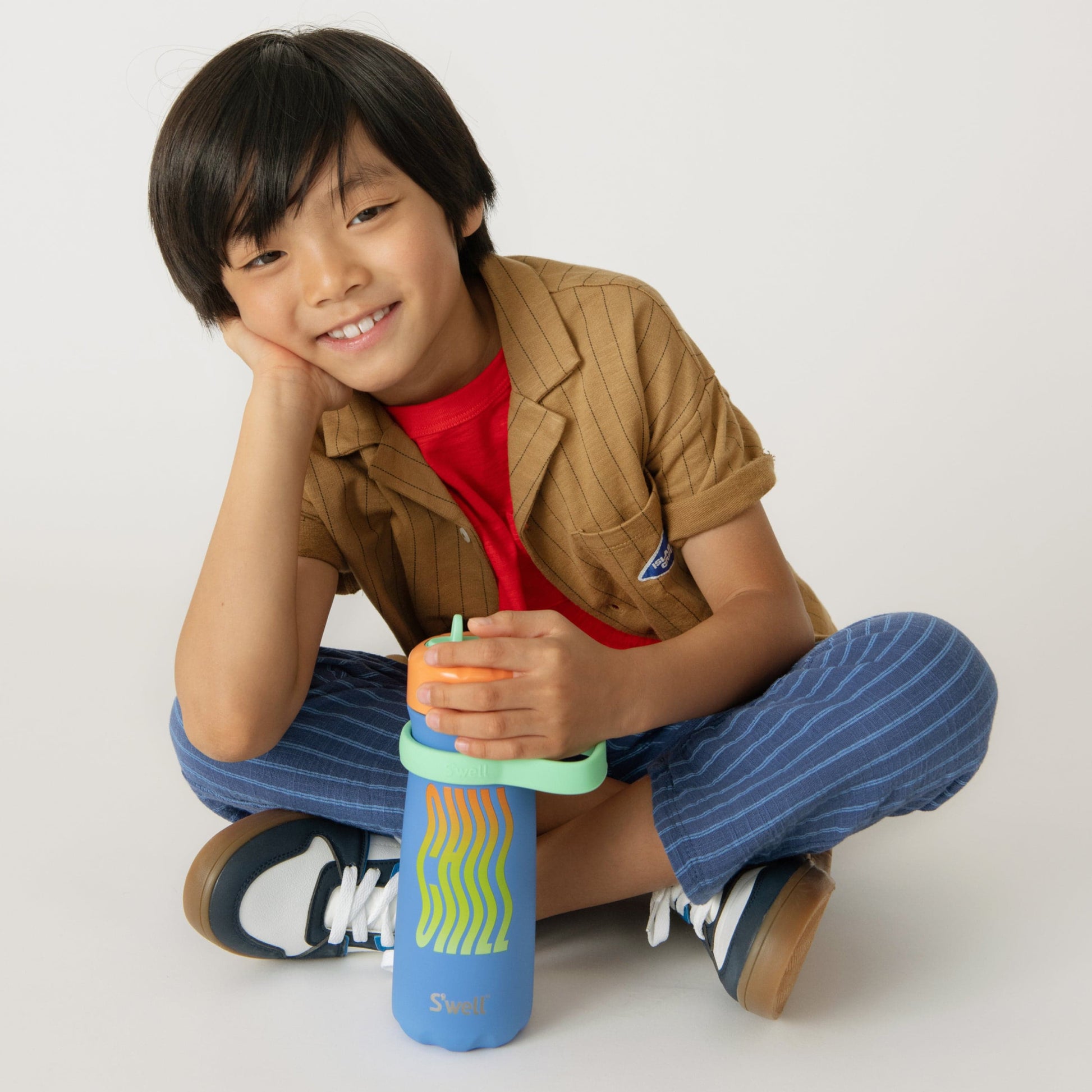 traveler-with-flip-straw-lid-16oz-w4 Swell-Kids-Water-Bottle-Traveler-16oz-Blue-Chill-Lifestyle.jpg