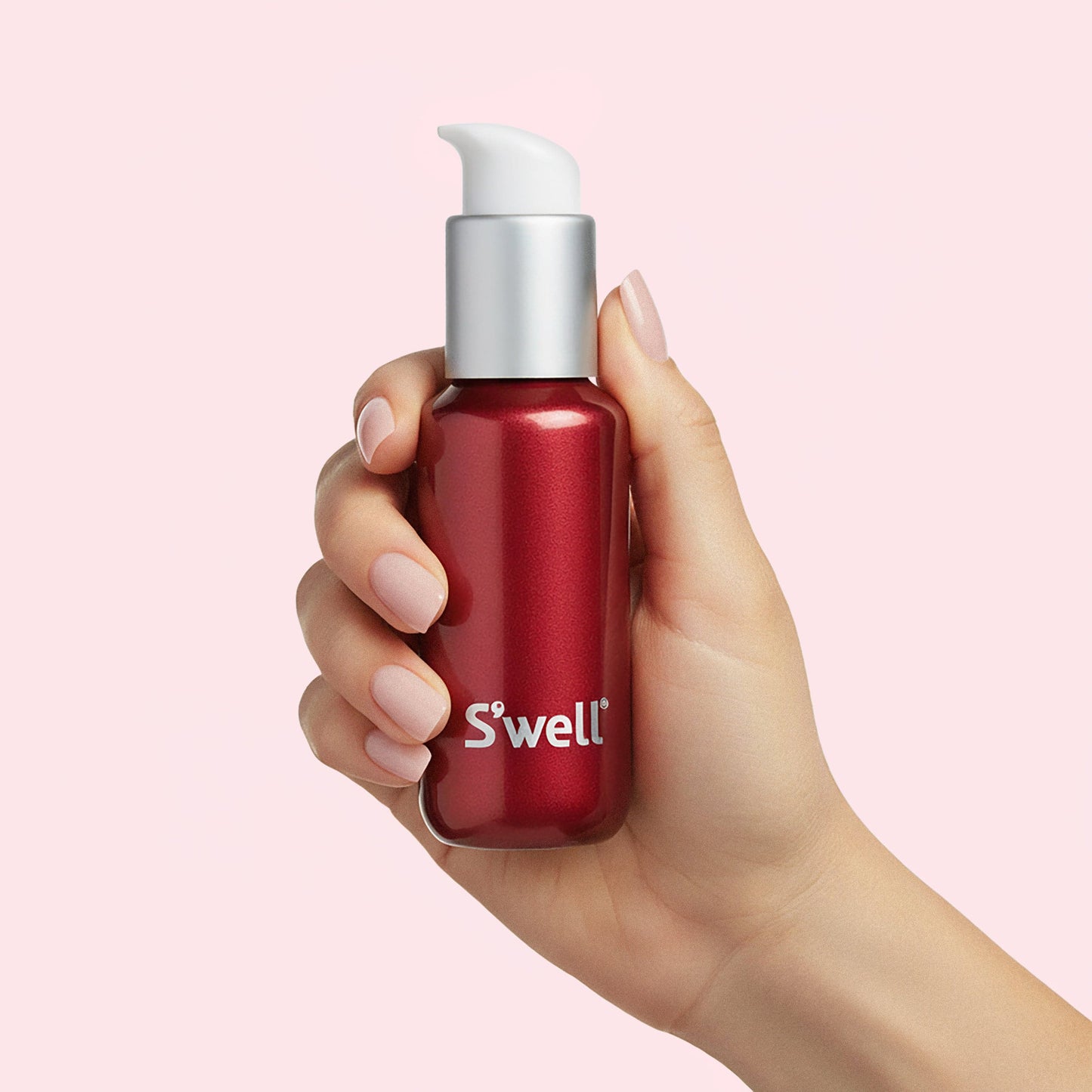 travel-bottle-set-i8 Swell_Cherry_Shimmer_Travel_Bottle_Front_Shimmer_Hand.jpg